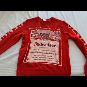Red knit sweater with Budweiser design